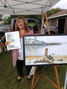 Harvest of Artists a Huge Success Artist Tania Taraniuk-Caputo with her alcohol ink and gouache paintings.